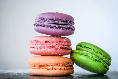 Macaron is a French pastry made with almond flour, egg whites, and sugar. It has a delicate, crispy exterior and a soft, chewy interior. It comes in a variety of flavors and colors.