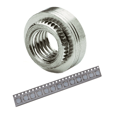 Surface mount nuts with adhesive patch, on tape for PC boards