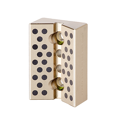 Guía prismática, Bronce con lubrificante sólido