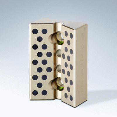 Guía prismática, Bronce con lubrificante sólido