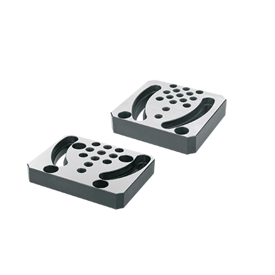 Adapter plates for T-slots and grid systems