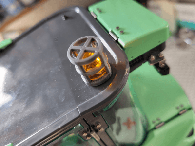 Rotating light cage for 1
